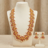 Kempu Guttapusalu necklace set displayed on mannequin