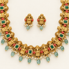 Close-up of Lakshmi motifs and matching earrings