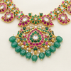 Jadau Kundan centrepiece and green bead drops close-up