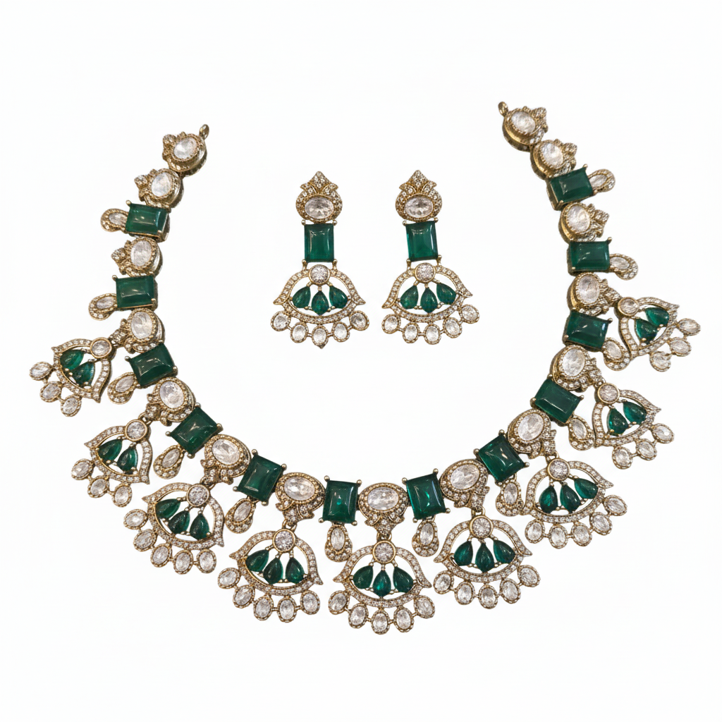 Victorian Kundan necklace set with emerald green gemstones on white background