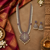 Oxidized Lakshmi long haram necklace and matching jhumka earrings in a cultural Indian flat lay