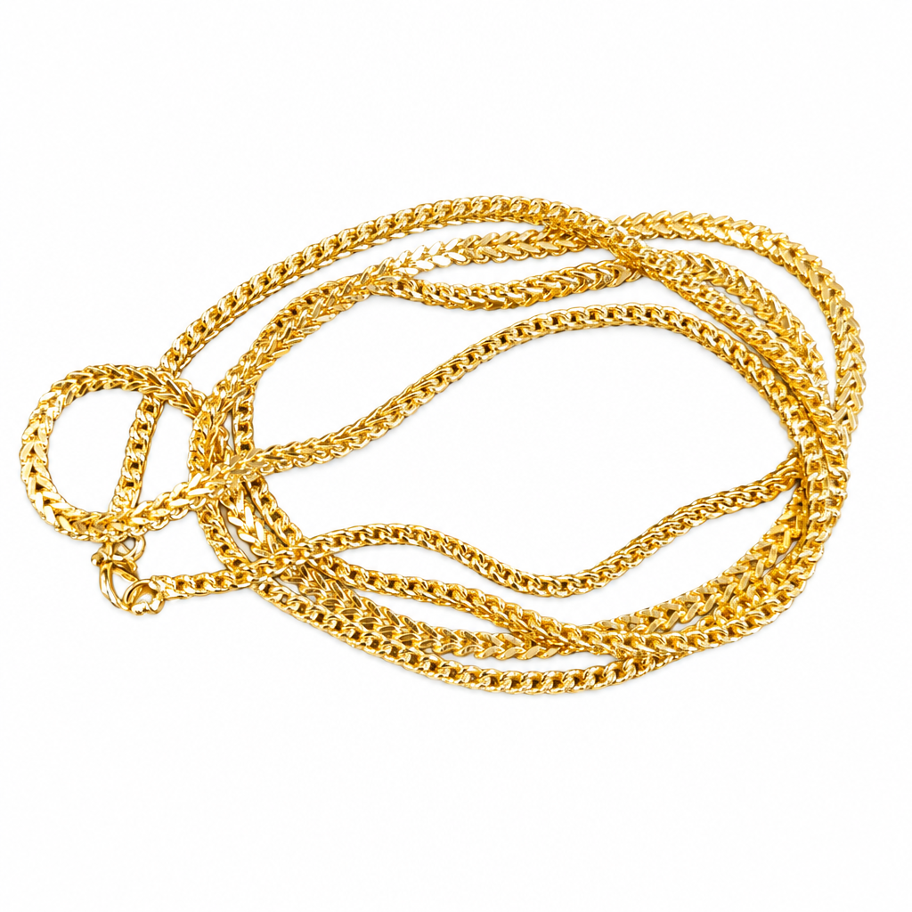 Gold-plated twisted link chain on a white background