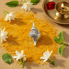 Silver Shankh Pendant – cultural flat lay with jasmine and puja thali