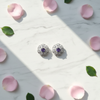 Purple CZ Halo Stud Earrings - Flat lay styling shot