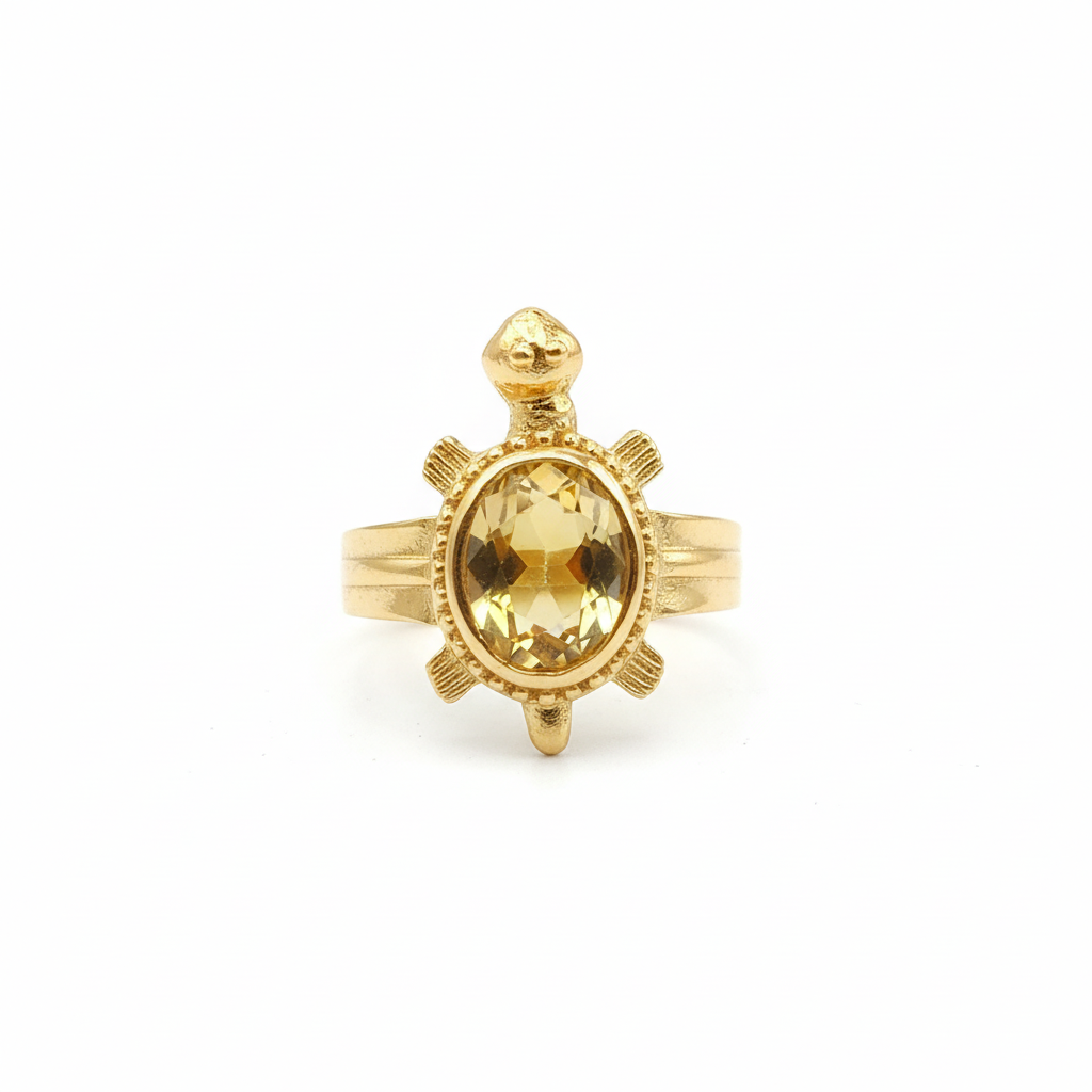 Gold turtle ring yellow stone white background product photo