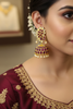 Model wearing Kempu Polki Jhumka