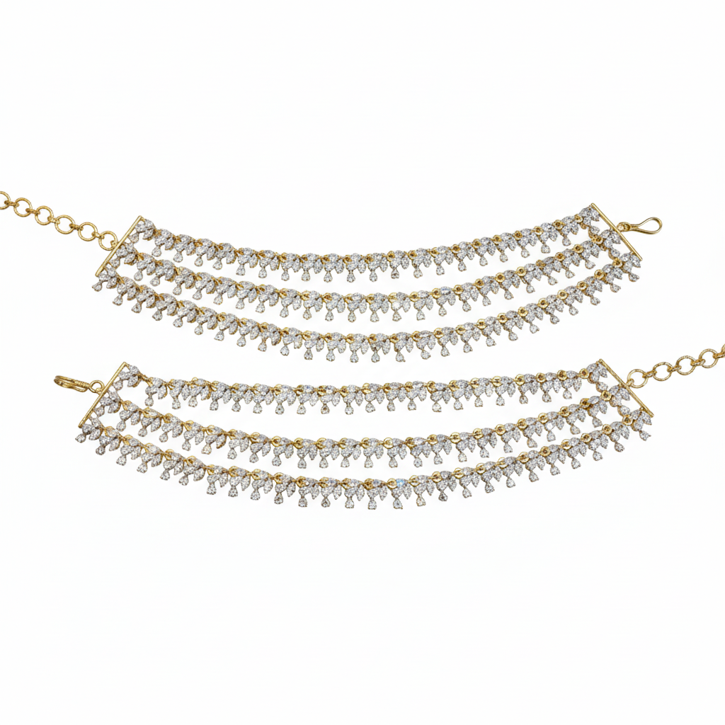 Gold-rhodium diamond ear chains on white background