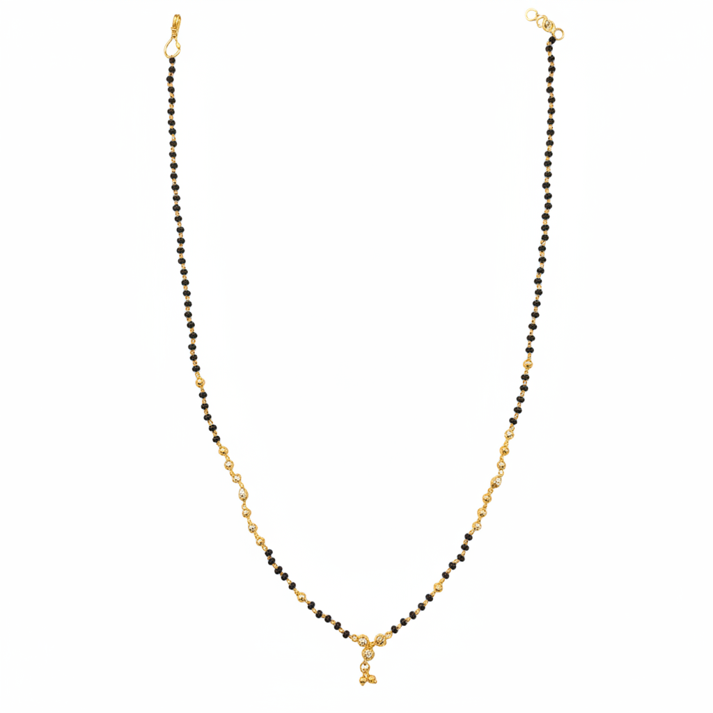 24K gold plated mangalsutra chain with black beads on white background