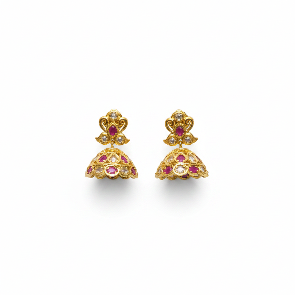 Uncut diamond pink jhumka earrings flat lay on white background