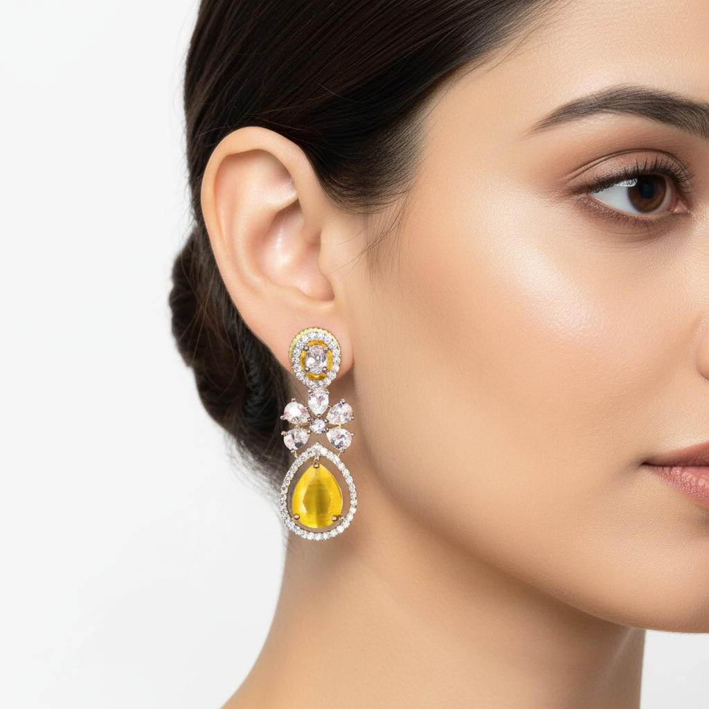 Model wearing CZ teardrop flower drop earrings in yellow