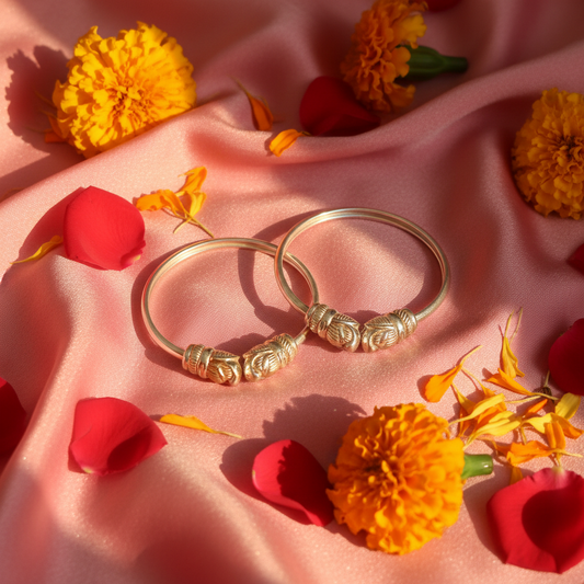 Lifestyle flat lay of silver elephant head bangles for kids