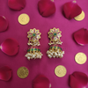 Star Flower Emerald Kundan Jhumka - Flat Lay on Pink Silk