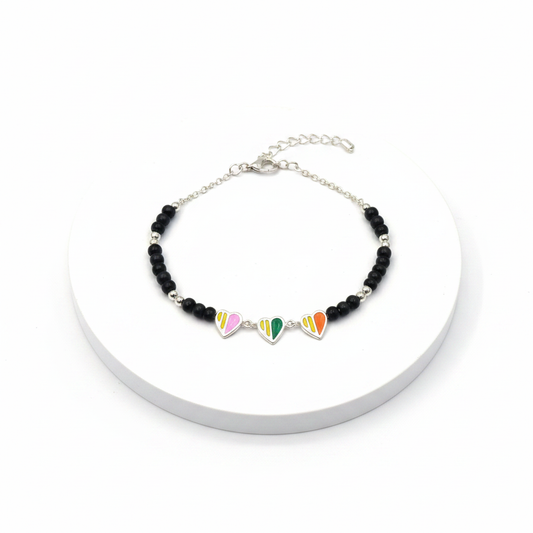 92.5 Silver Kids Bracelet with Pastel Striped Enamel Heart Charms on white background