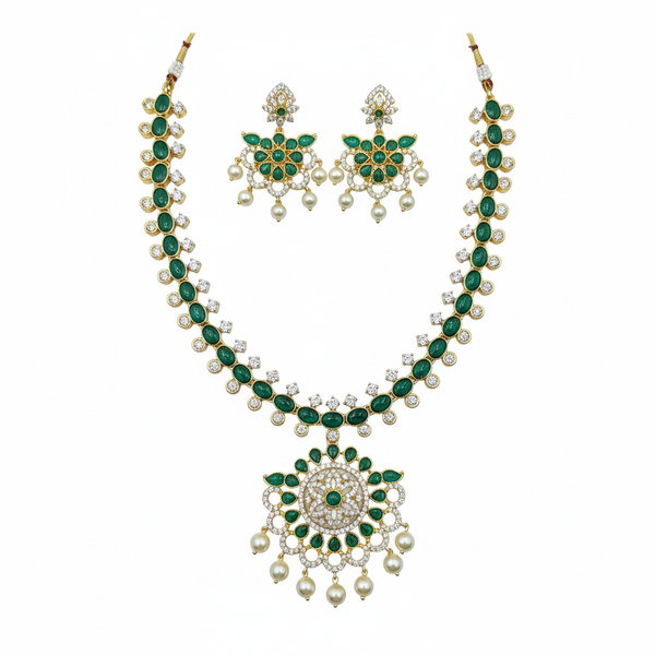 Emerald green CZ necklace set flat lay white background