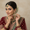 Model wearing Jadau Kundan Chandbali - Emerald Ruby variant