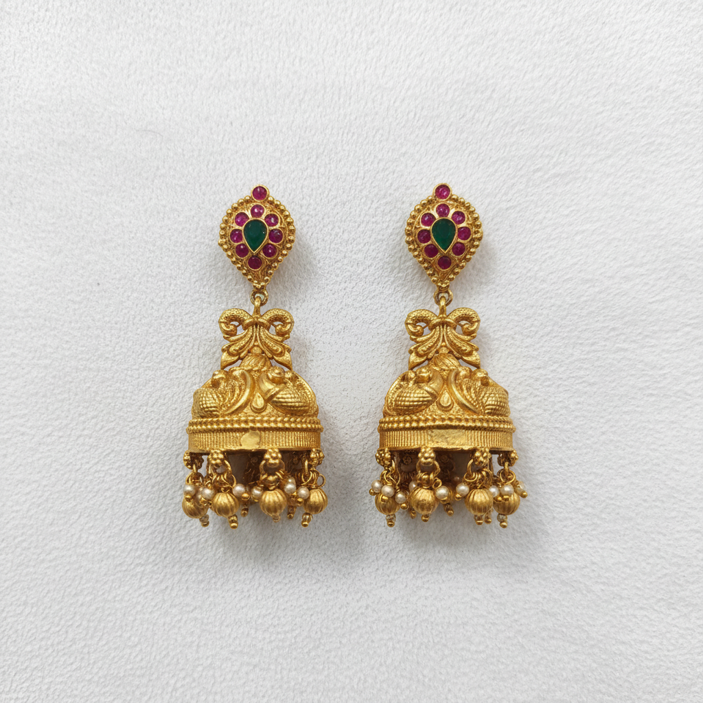 Antique Gold Kemp Peacock Temple Jhumka Earrings flat lay on white background