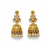 Flat lay of antique jhumka earrings on white background