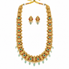 Full necklace and earrings on white background