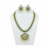 Emerald green CZ necklace set on mannequin bust white background