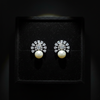 Black Rhodium Pearl Crown Stud Earrings on velvet display