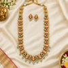 Lakshmi haram and earrings on festive flat lay