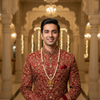 Indian groom wearing Narasimha temple pearl necklace at wedding