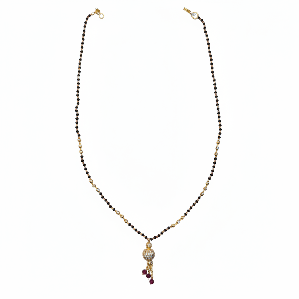 24K gold plated black bead necklace with ornate pendant on white background