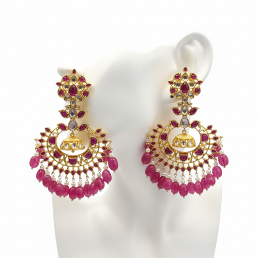 Kempu Polki Chandbali Earrings displayed on jewelry mannequin ear stand, white background