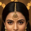 Lifestyle shot of dome filigree maang tikka worn on forehead