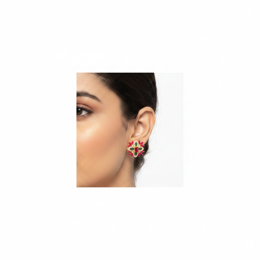 Model wearing ruby green two-tone starburst flower stud earrings