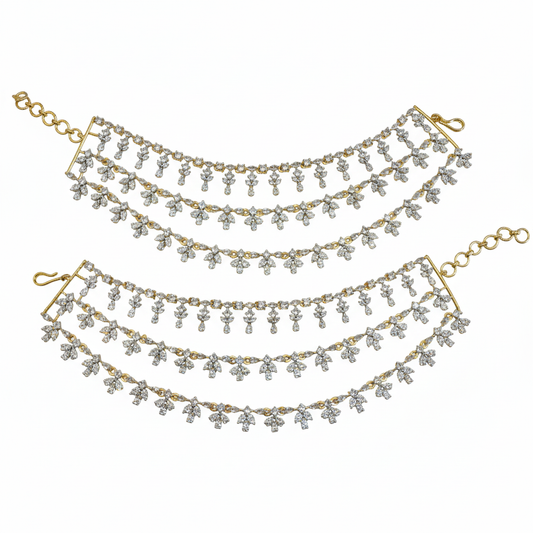 Rhodium-gold diamond ear chains on white background