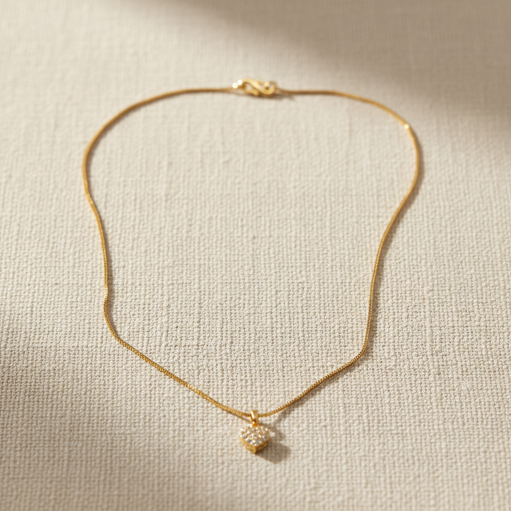 Lifestyle image of gold heart pendant necklace