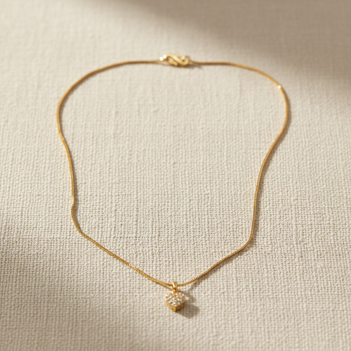 Lifestyle image of gold heart pendant necklace