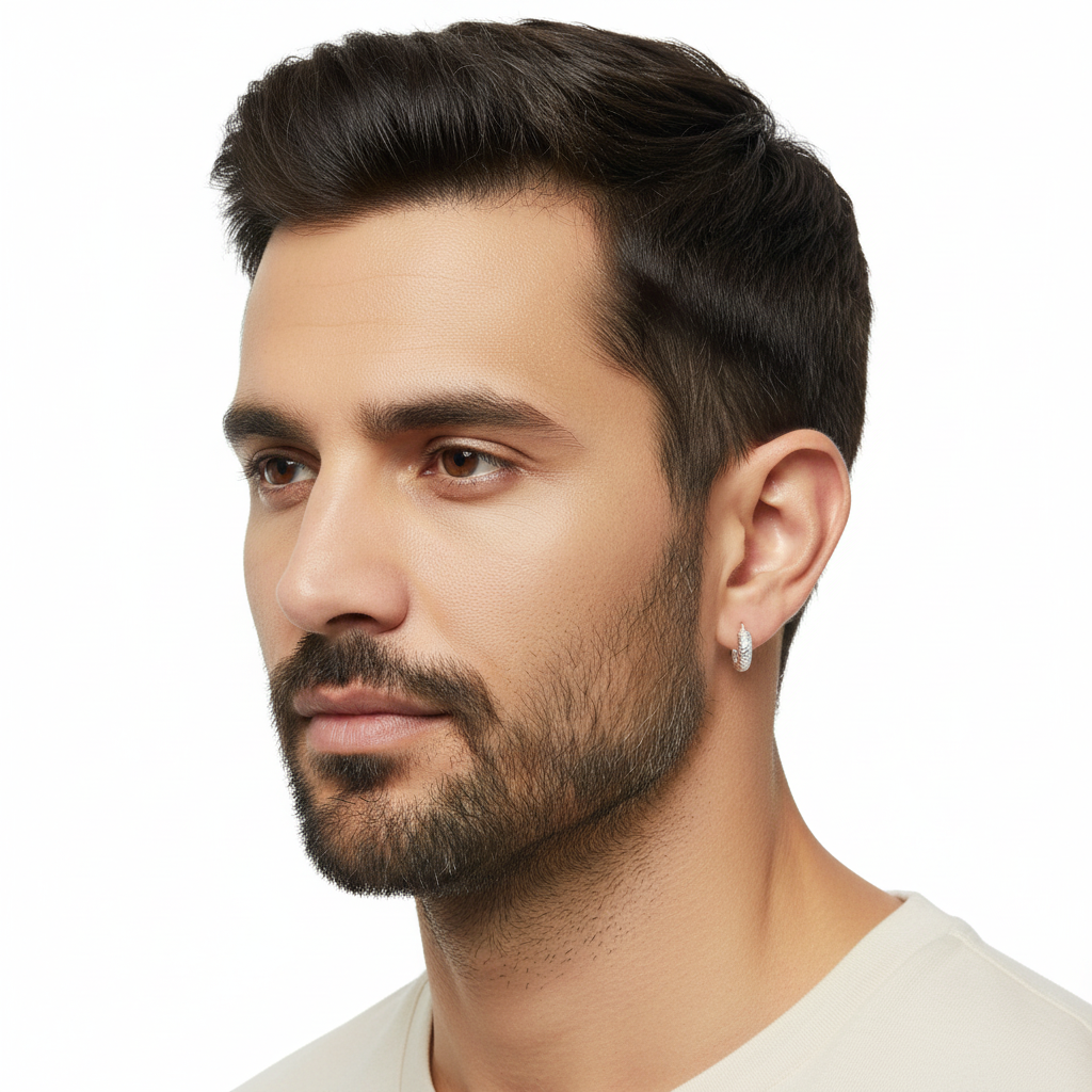 Man wearing sterling silver hoop earrings