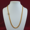 Mannequin display of gold-plated temple jewelry necklace