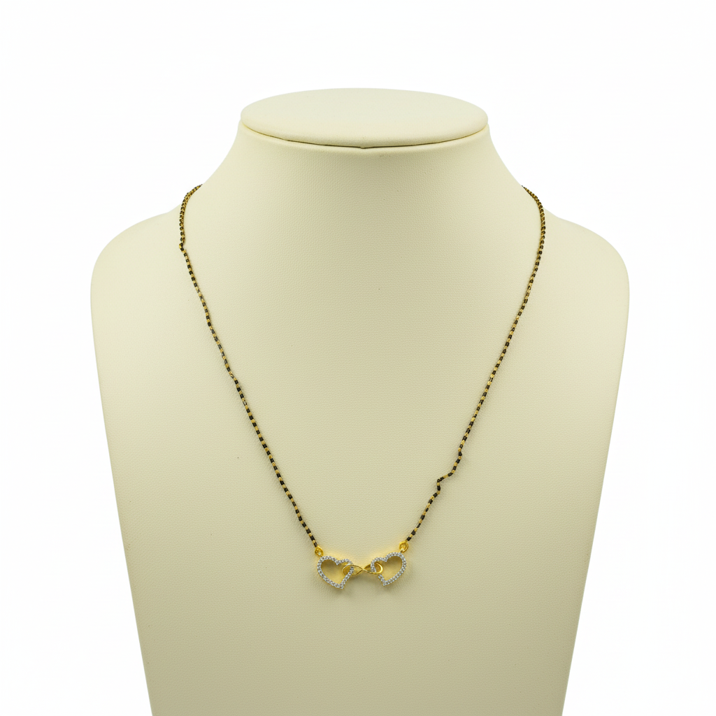 Mannequin display of heart pendant mangalsutra