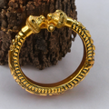 mens kada with lion head design on a wooden background