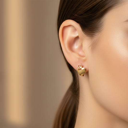 Model wearing Gold Heart Hoop Earrings