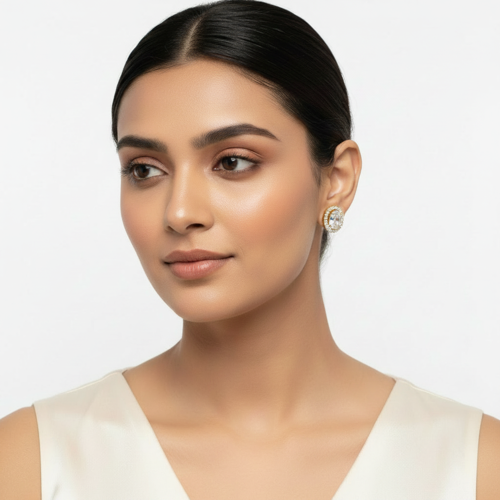 Model wearing oval crystal halo stud earrings