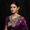 Model wearing teal haram with chandbali earrings