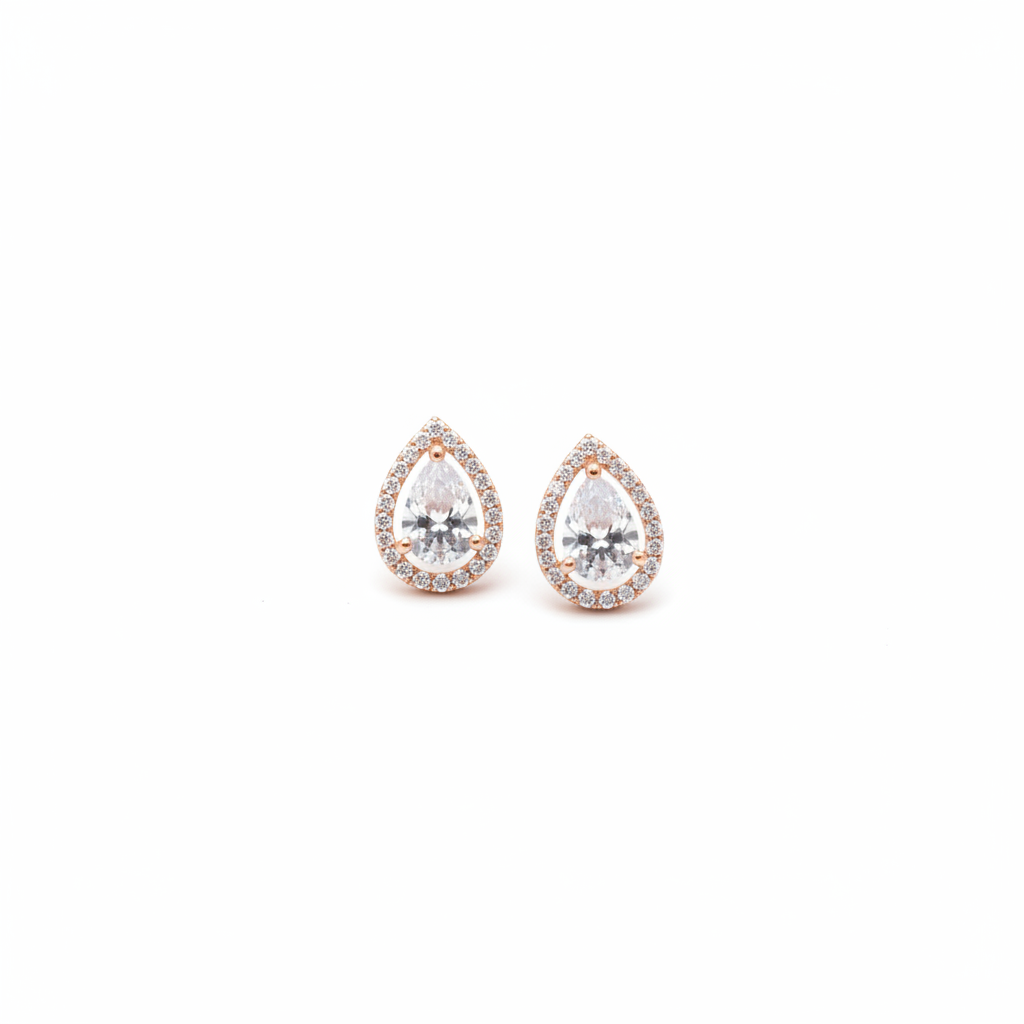 Pear teardrop rose gold halo stud earrings on white background