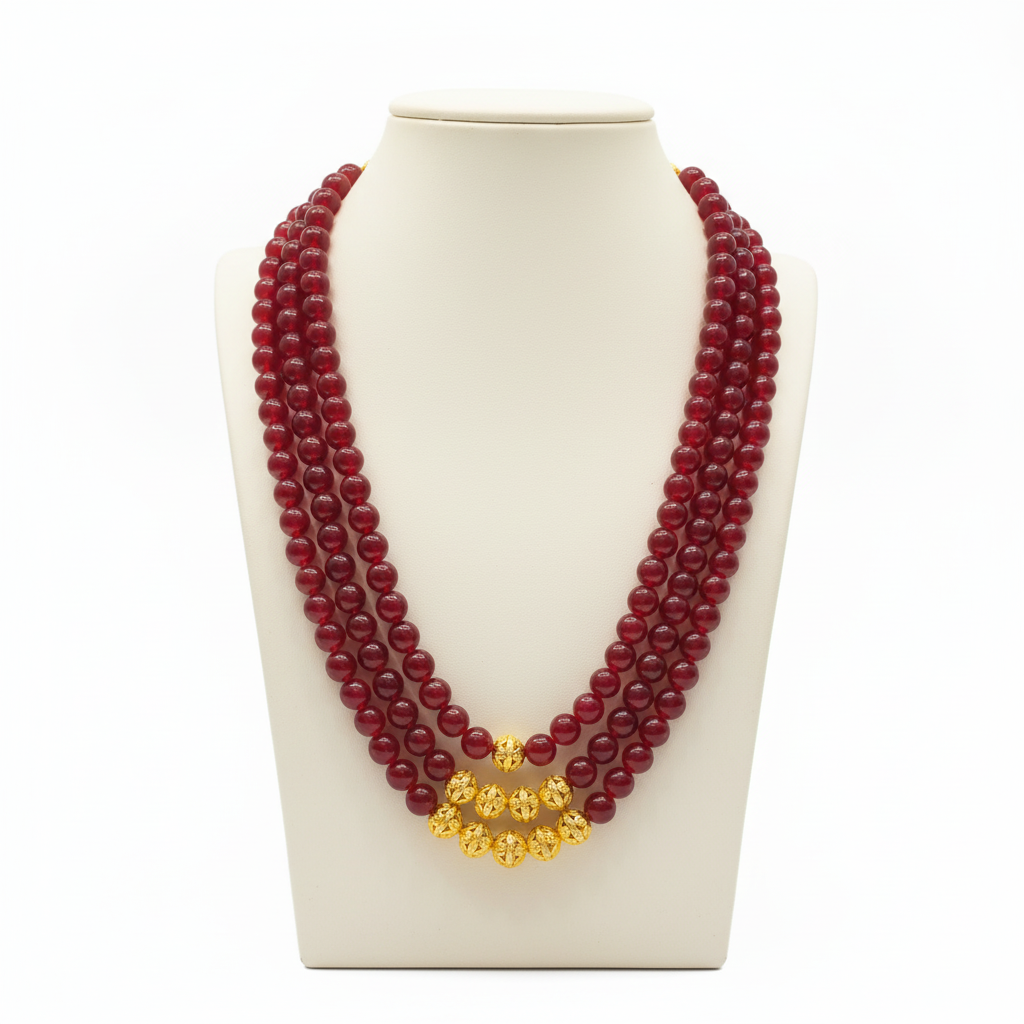 Red beaded necklace on mannequin