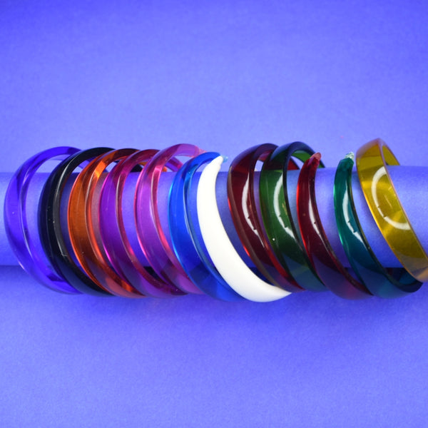 12 colorful bangle bracelets to mix and match with interchangeable pendants