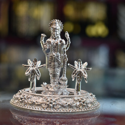 "Radiant Reverence: The Graceful Majesty of a Lord Vishnu Silver Idol"