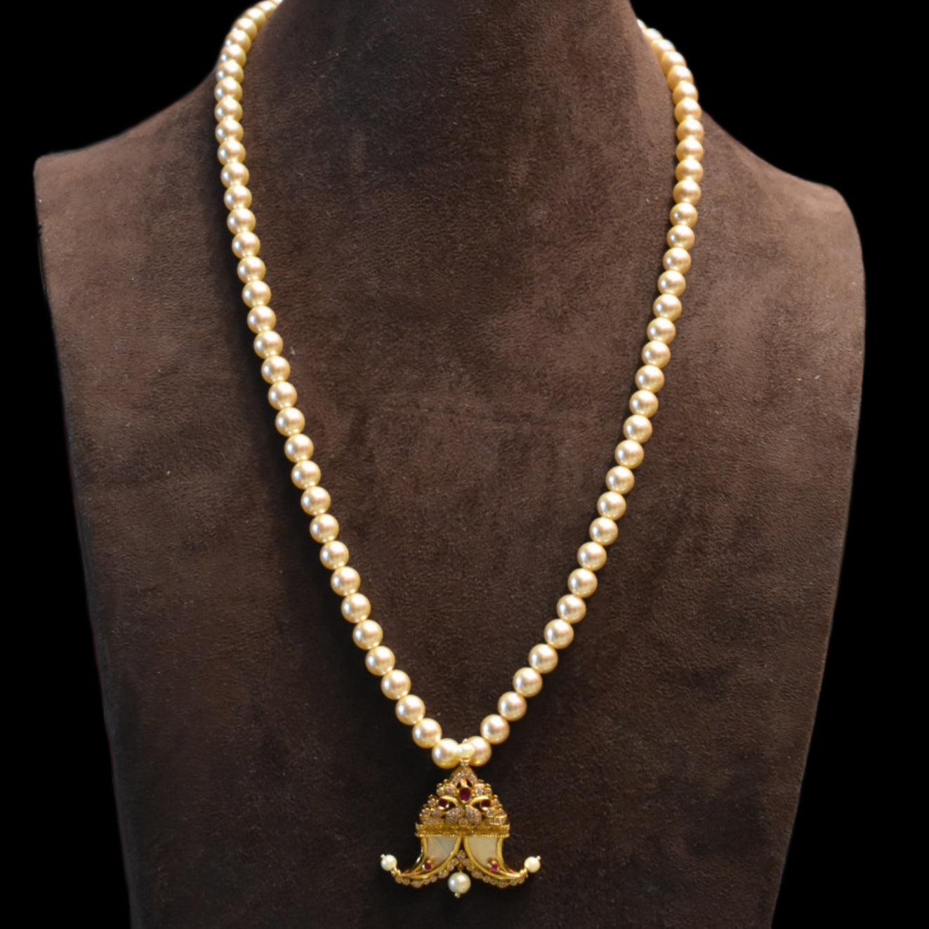 "Pearls of Elegance: Antique Finish Cz Puligoru Locket Necklace for Fashionable Kids"