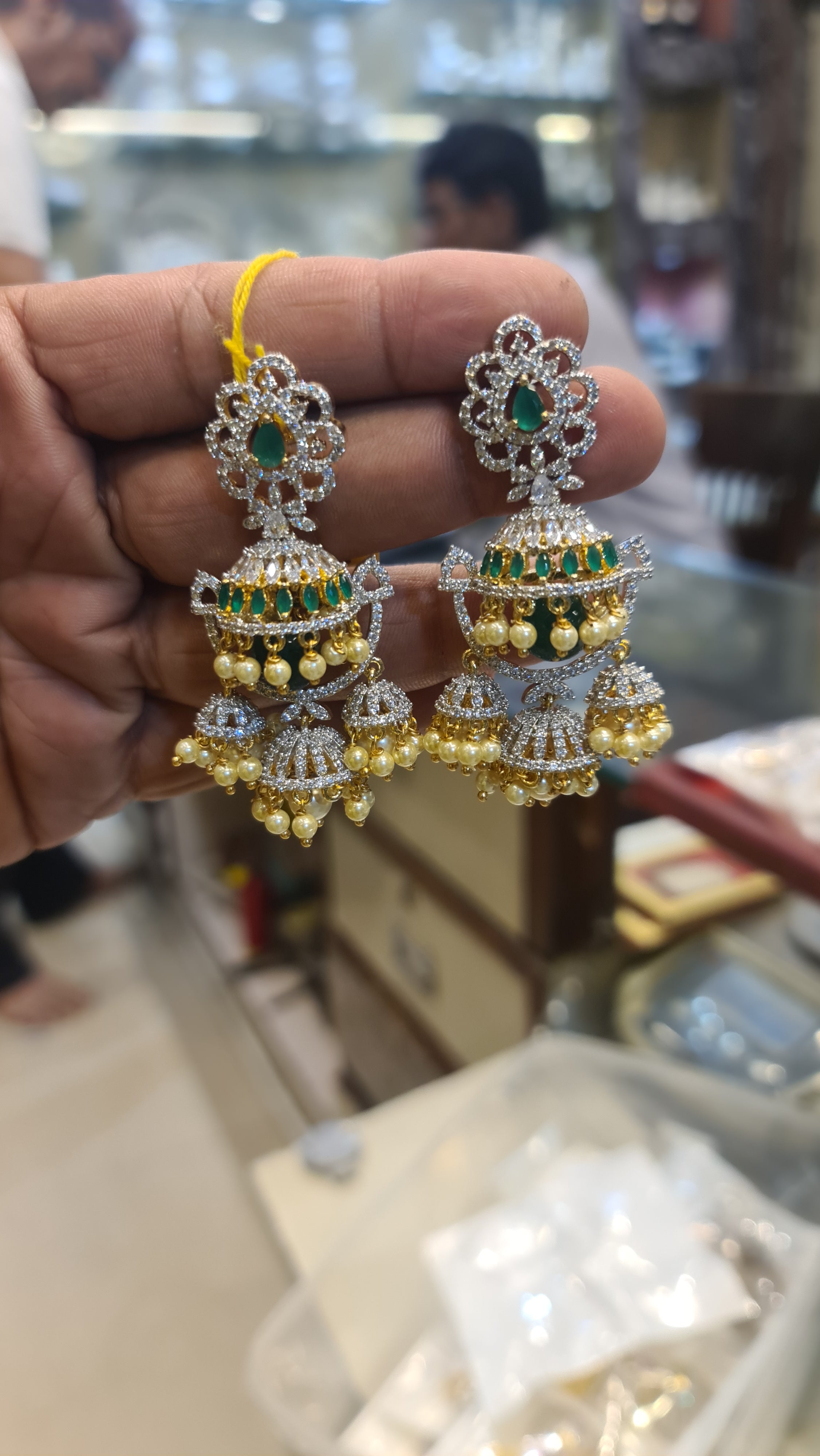 Bahubali Double Jhumka Earrings with Emerald & Pearl Drops