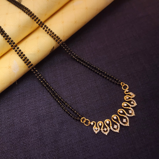 "Gleaming Elegance: The Exquisite Gold-Plated Mangalsutra Adorned with American Diamonds and Beads"