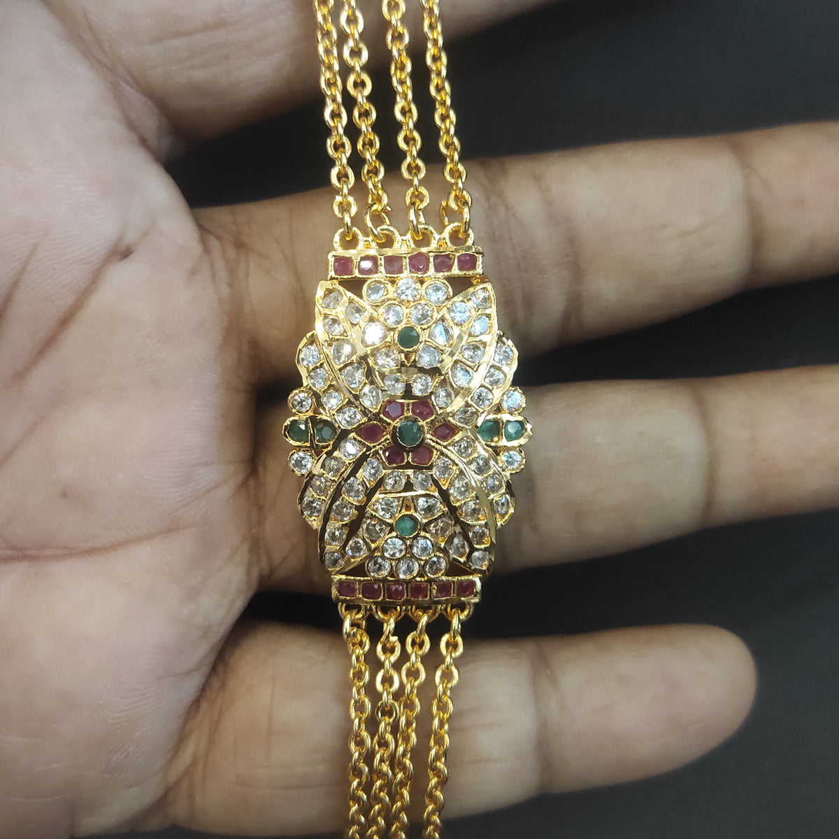 Multi-Strand Gold Chain Necklace with Ornate Floral Centerpiece