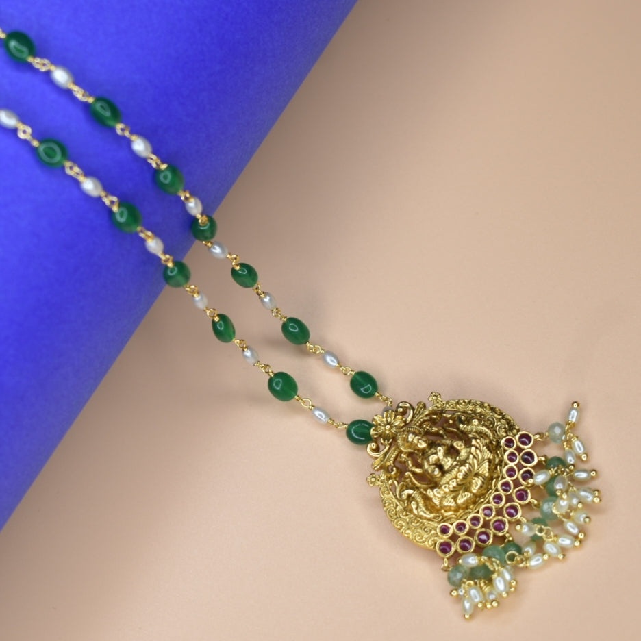 "Nagas Laxmi: A Regal Fusion of Elegance and Tradition in Emerald Beads Necklace"