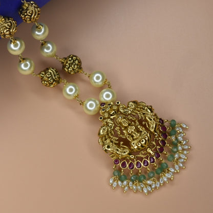 "Divine Elegance: Nagas Goddess Lakshmi Pendant Adorned with Pearl Chain"